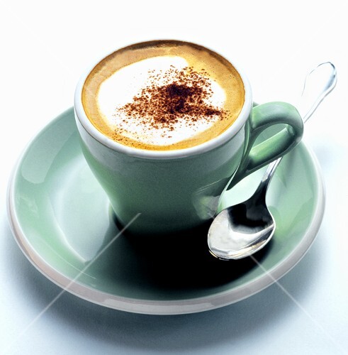 A Cup of Capuccino with Cinnamon; Spoon