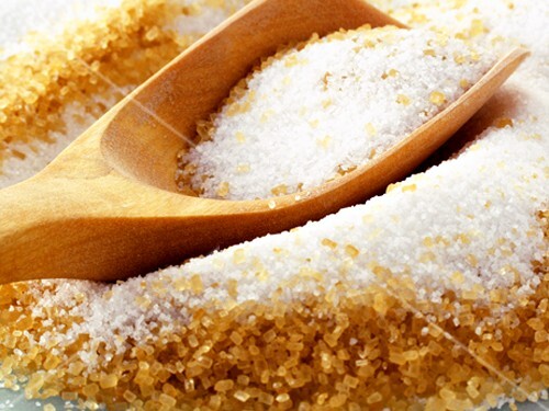 White and Brown Sugar with Wooden Scoop