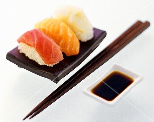 Nigiri Sushi with Dipping Sauce and Chopsticks