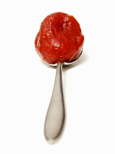 One Canned Tomato on a Spoon