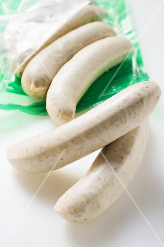 White sausages with packaging