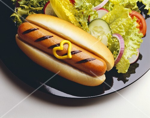 Grilled Hot Dog with Mustard Heart and Side Salad