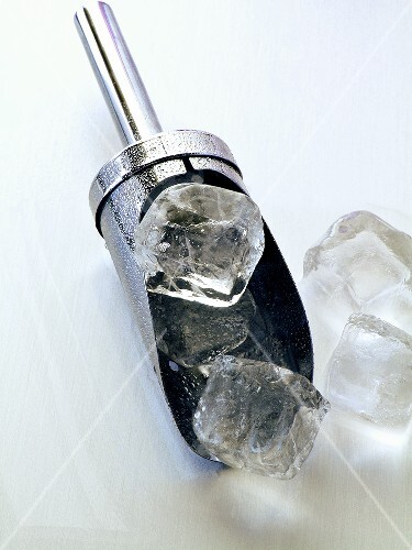 Ice cubes on small metal scoop (2)