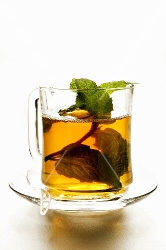 Peppermint tea with sprig of fresh mint