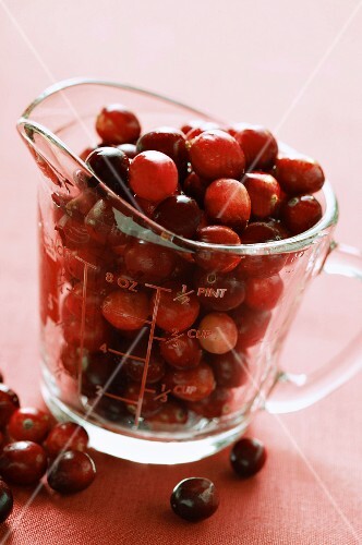 Cranberries in measuring jug