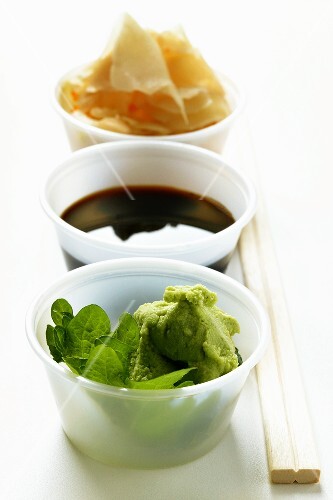 Sushi accompaniments: soy sauce, ginger and wasabi