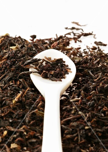 Dry Ceylon tea with spoon