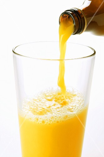 Pouring orange juice