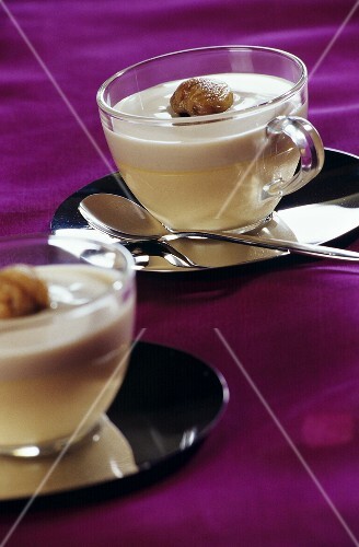 Cappuccino ice cream with glazed chestnuts in glass cups