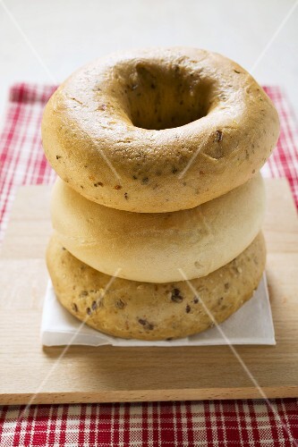 Three different bagels, in a pile