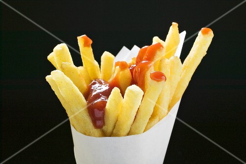 Chips with ketchup in paper cone