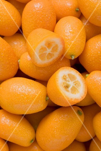 Many kumquats, one halved