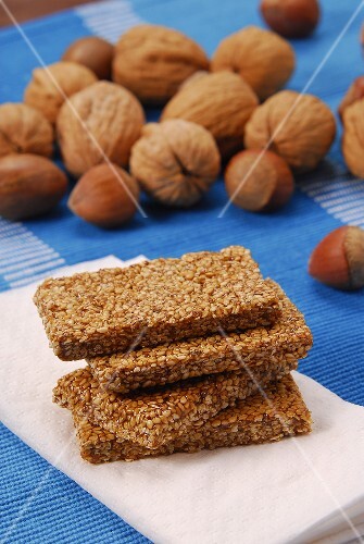 A few bars of sesame brittle, nuts in background
