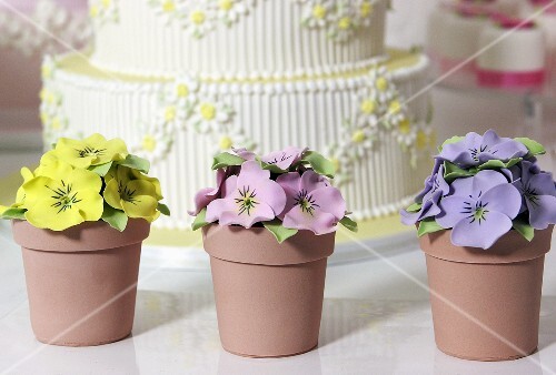 Wedding cake and artificial pansies