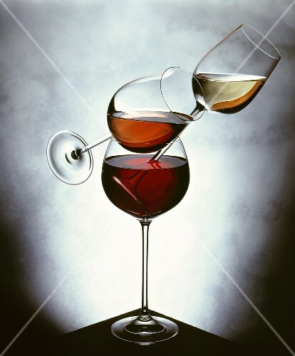 Still life with white wine, rosé wine & red wine in glasses
