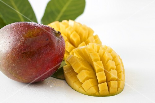 Mangos, whole and cut into cubes