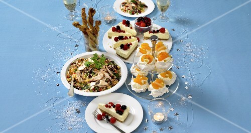 Main courses and desserts on party buffet