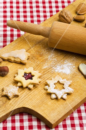 Assorted biscuits on wooden board