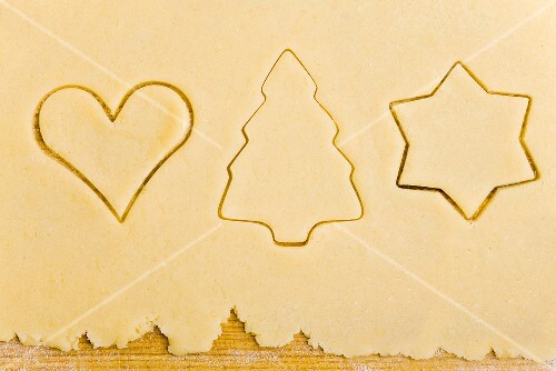Biscuit dough with cut-out biscuits