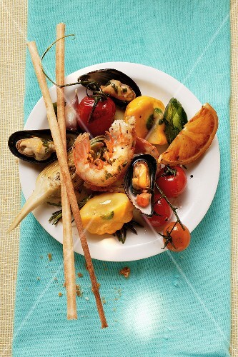 Plate of Mediterranean appetisers with grissini