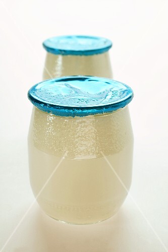 Two jars of yoghurt