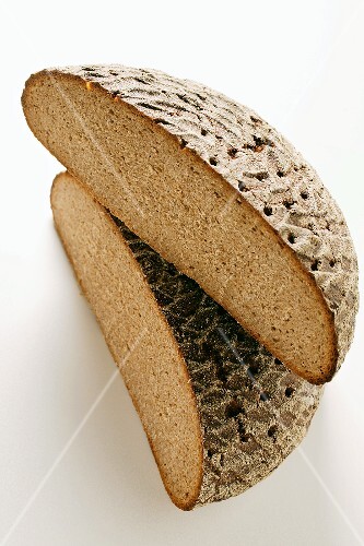 A loaf of farmhouse bread, halved