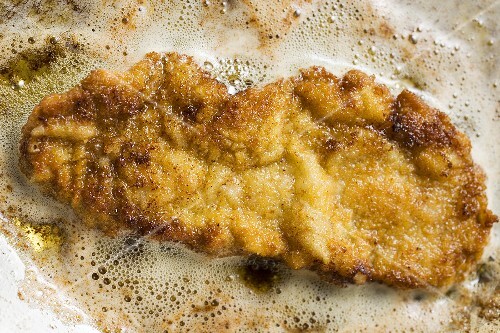 Frying escalope in frying pan