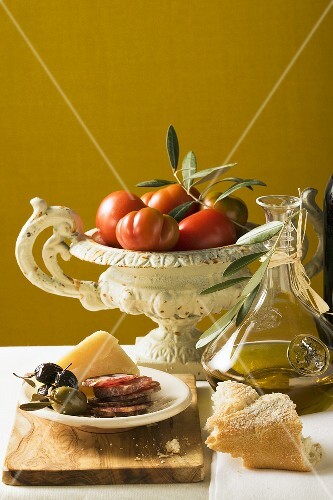 Olives, sausage, Parmesan, bread, olive oil and tomatoes