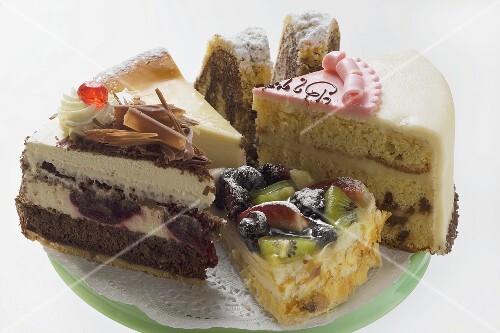 A selection of pieces of cake on cake stand