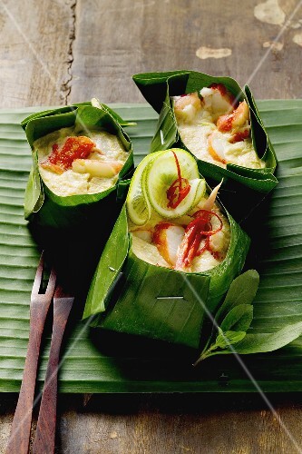 Crabmeat with coconut sauce in banana leaf