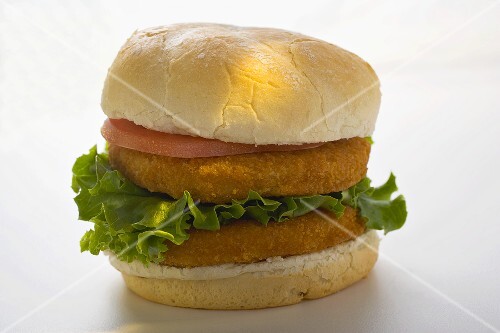 Double chicken burger with tomato and lettuce