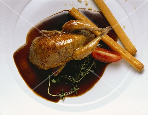 Quail with balsamic sauce & breadsticks