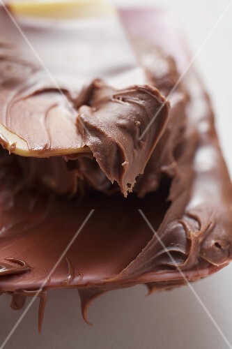 Mixing spoon with melted chocolate