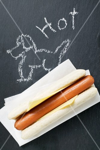 A hot dog on a blackboard (with drawing)