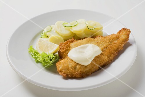 Fish fillet with mayonnaise and potato salad