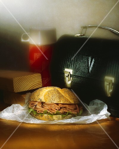 Roast Beef Sandwich on a Poppy Seed Bun; Lunchbox and Thermos