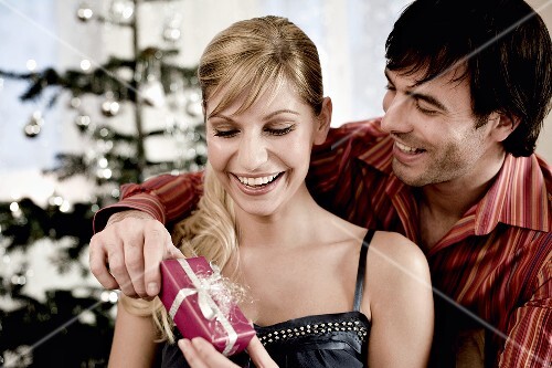 Man giving woman a gift