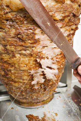 Slicing döner meat from the spit