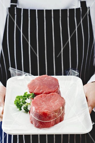 Two slices of beef fillet tied with string
