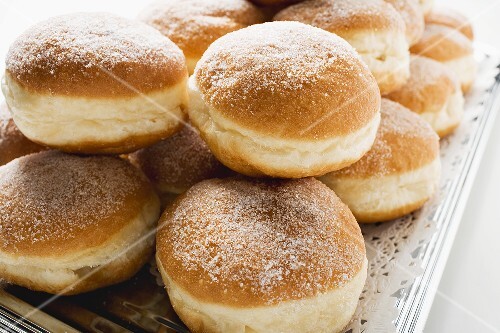 Fresh doughnuts on a silver platter