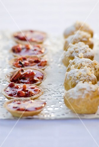 Profiteroles and tartlets on a tray