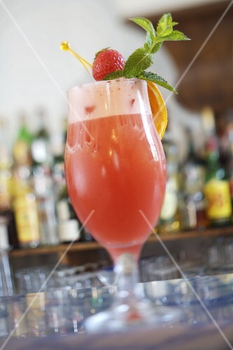 A fruit cocktail on a bar counter