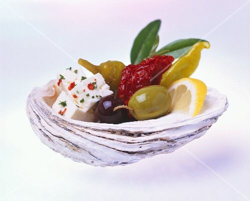 Feta with olives and chillies in a shell