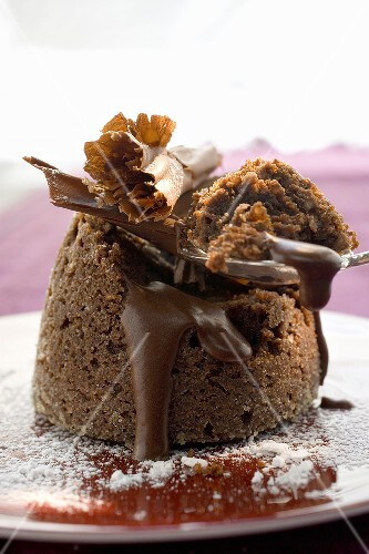 Chocolate soufflé filled with chocolate sauce