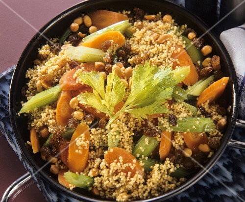 Millet stew with raisins, peanuts, carrots & celery