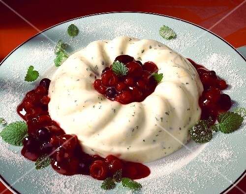 Yogurt mint pudding with raspberry sauce