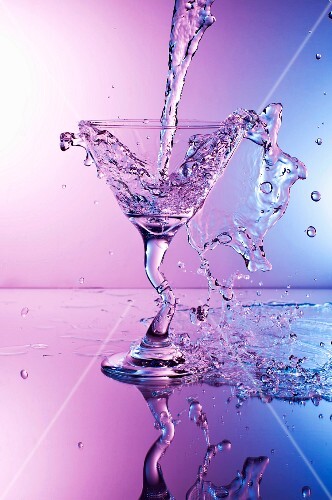 Martini Splashing Into a Glass