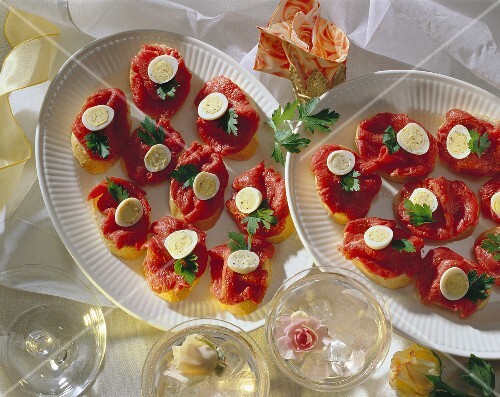 French Bread Slices with Fillet of Beef and Quail Eggs