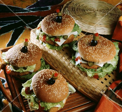 Four fish burgers with breaded hake