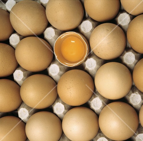 Egg Carton with Whole Eggs; One Cracked Open
